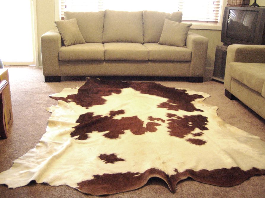 DELUXE HEREFORD RED AND WHITE HAIR ON COW HIDE RUG : $420